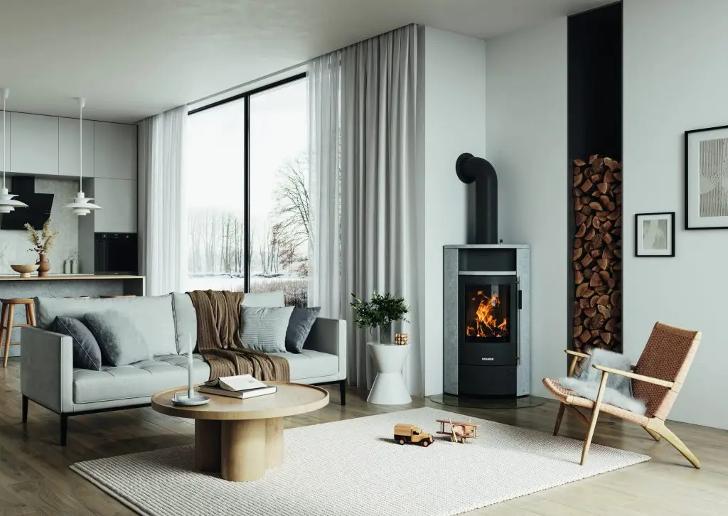 Ambientebild Kaminofen Polar Neo Eck in gemütlichem Wohnzimmer im Winter