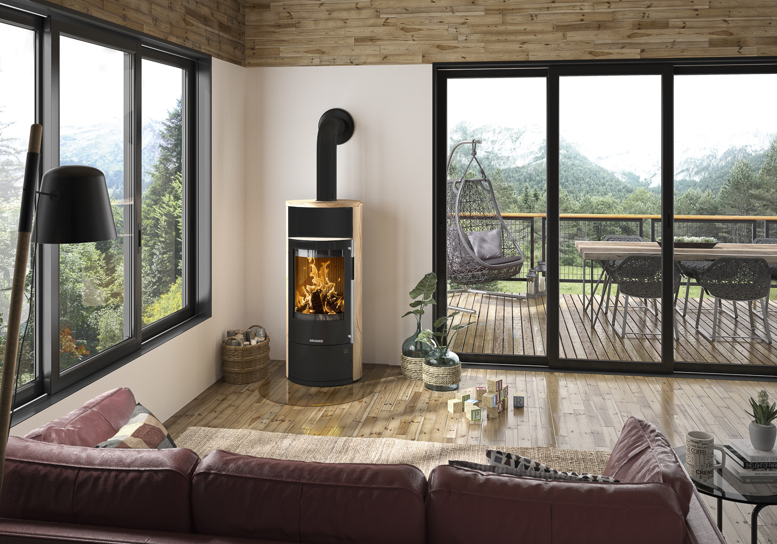 ORANIER Holzkaminofen Polar Neo 8 Stahl Schwarz Sandstein in Wohnzimmer mit Terasse mit Hängesessel und Essbereich durch Fensterfront zu sehen.