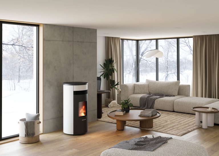 Vintage Wohnung mit Design-Pelletofen. Kleine Bar und Kochinsel im Hintergrund.
